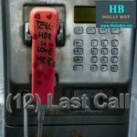 payphone with graffiti written on the handset "tell her you love her"